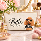 Cream makeup pouch with an apricot Poodle in sunglasses and a striped top with Bella sample name on a vanity