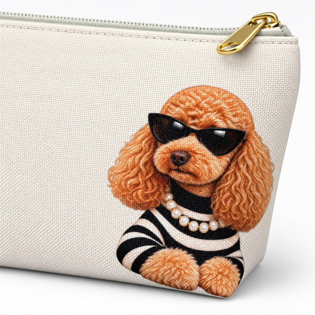 Cream makeup pouch with an apricot Poodle in sunglasses and a striped top close-up of the dog print and gold zipper