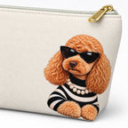 Cream makeup pouch with an apricot Poodle in sunglasses and a striped top close-up of the dog print and gold zipper
