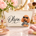 Cream makeup pouch with an apricot Poodle in sunglasses and a striped top with Olivia sample name on a vanity